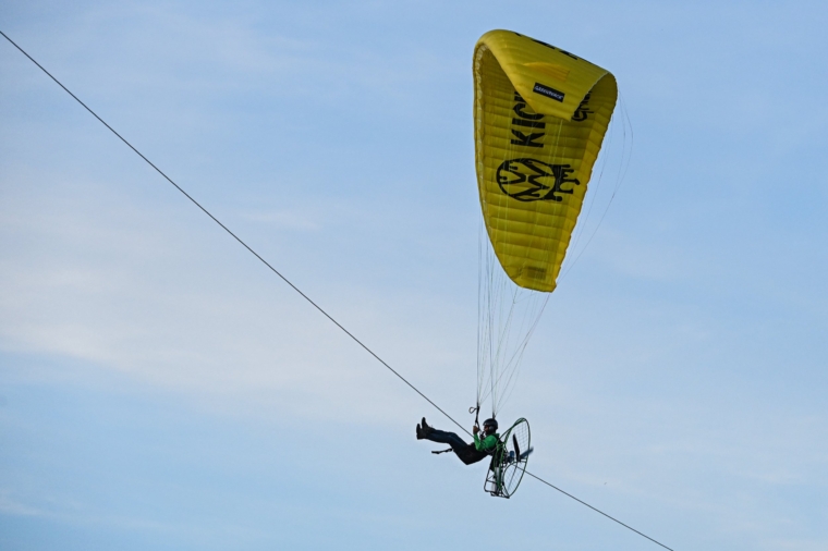 Greenpeace Protester Caught in the Wires